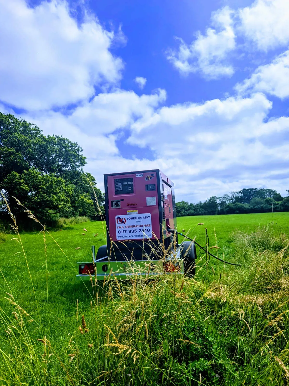 A tractor is parked in the middle of a field.