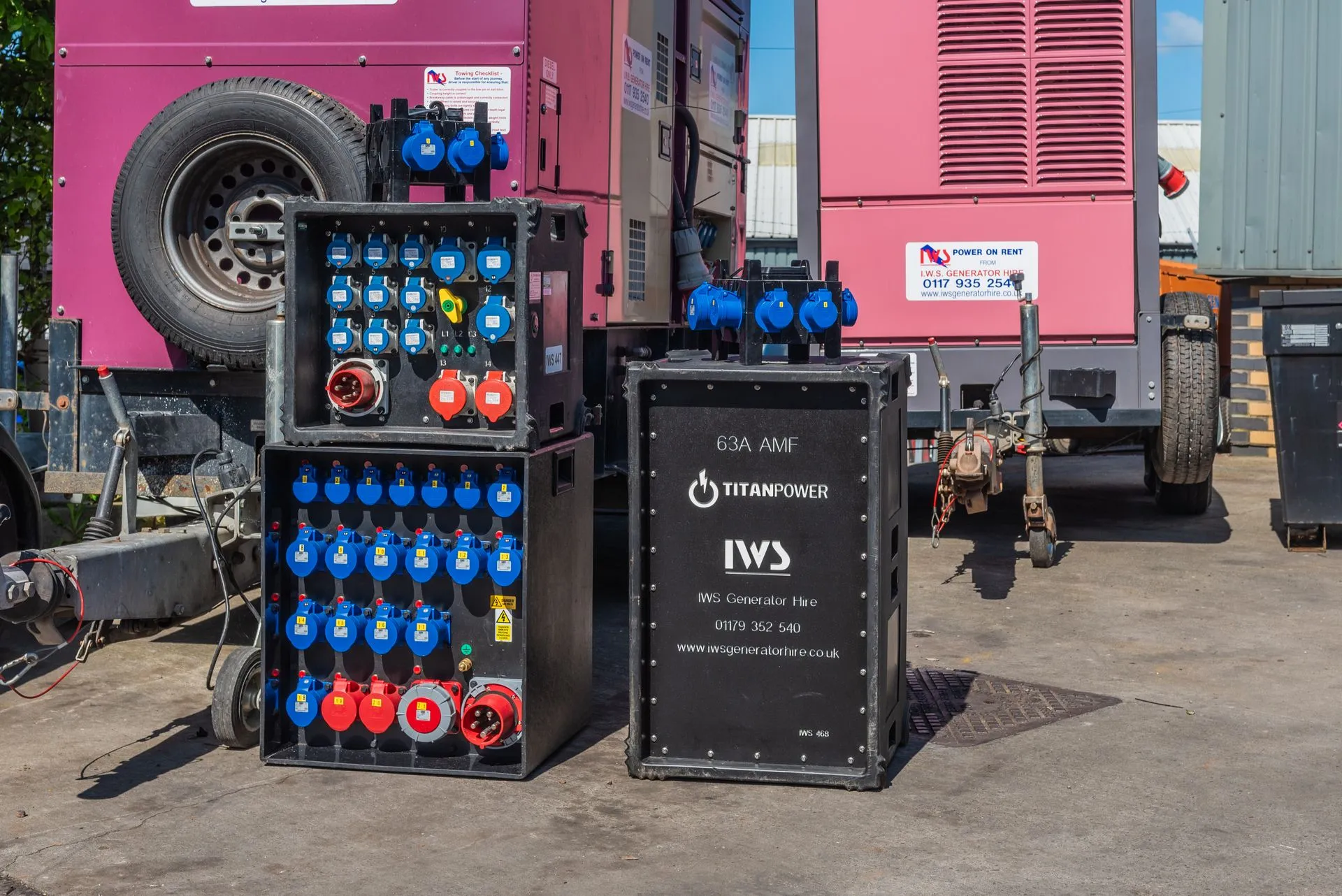 A couple of boxes that are next to a truck.